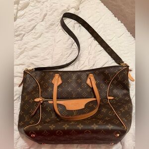 Louis Vuitton Monogram Handbag with Red Interior
Tournelle MM